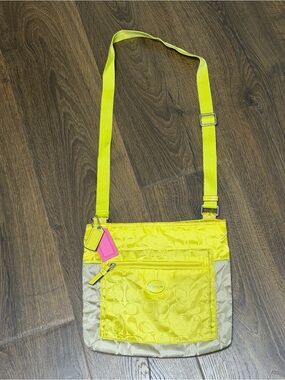 Coach  Nylon Colorblock in Citrine/Light Khaki, featuring a bright yellow strap